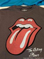 Closeup photo of the front chest area showing the large red tongue and lips logo with "The Rolling Stones" text