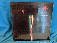 Front cover of Steely Dan Aja vinyl record album showing the stylized face design and album title.