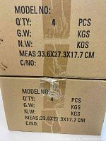 Cardboard box showing packing details and quantity (4 pieces per box).