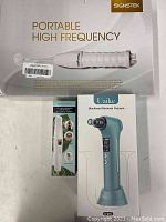 Signstek portable high frequency facial device box showing the product and brand name, highlighting its use for acne treatment and 4 head attachments included.