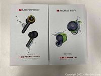 Front view of two Monster earphone boxes showing Clarity 102 Plus Airlinks and iSport Champion models.
