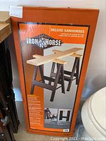 Box of Iron Horse Deluxe Sawhorses showing brand and product image on the front.