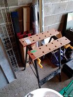 Ultra steel work bench and two saw horses with wooden clamp tops
