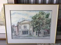 Close-up image of one framed artwork showing a neoclassical building with columns and greenery.