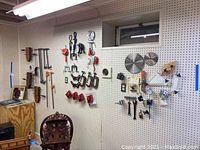 Wide view of pegboard showing most clamps grouped by type