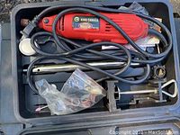 King Canada rotary tool with power cord and accessories inside carrying case