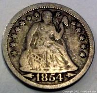 Obverse view of 1854 Seated Liberty Dime showing Lady Liberty seated with date below and 13 stars around.
