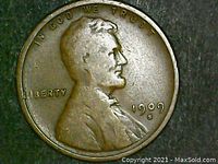 Obverse view of 1909 S Lincoln Wheat Cent showing date, mint mark and Abraham Lincoln profile.