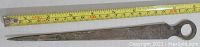 Full length of the letter opener with measuring tape showing length about 9.5 inches.