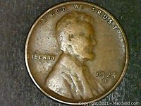 Obverse side showing Lincoln profile, date 1924 and mintmark D, with inscriptions 'IN GOD WE TRUST' and 'LIBERTY'.