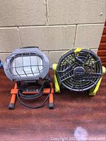 Front view of the Ryobi portable fan and orange work light side by side on wooden surface