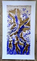 Full view of the lithograph depicting abstract blue and bronze human forms and shapes on white background.