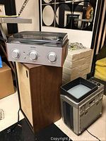 Jensen turntable atop one of the Criterion speakers with Panasonic portable TV beside.