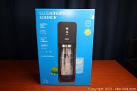 Front view of the SodaStream Source box showing the product image and branding.