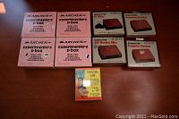 Lot of 4 pink Archer Experimenters P-Box empty kit boxes and 5 vintage Science Fair electronics kits including RF Meter, AM Wireless Microphone, Frequency Standard, and a Headstart's Game card deck.