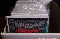 Front cover of Spider-Man comic showing the first all-new collector's item issue in protective sleeve inside a short comic box.