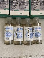 Photo of 4 Eco Logical Hand Sanitizer bottles showing front labels with product details in English and French.