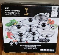Front of the box showing brand, model, and image of the cookware set components.