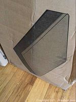 Cardboard packaging showing a mattress-shaped graphic