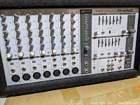 Front panel showing seven channels with XLR and 1/4″ inputs, gain and level controls