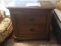 Full front view of three-drawer chest showing overall condition and style