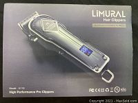 Front of packaging box showing LiMURAL branding, product model K11S, digital display on clipper, and product title 'High Performance Pro Clippers'.