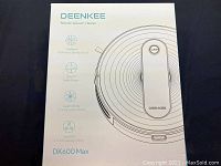 Original box of Deenkee DK600 Max showing branding, features like 4 efficient cleaning modes, low profile design, and strong suction power