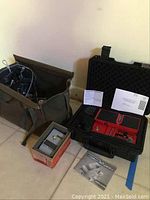 Soft canvas bag open showing assorted audio cables