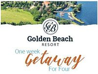 Promotional banner showing 'Golden Beach Resort One week Getaway For Four' with aerial lake and marina view