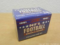 Factory sealed 1991 Score NFL Football Rookie and Traded 110 Player Card Set in blue box with red, white and gold text.