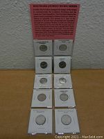 Complete set of six Westward Journey Nickels displayed in protective holders with informational label about the series.