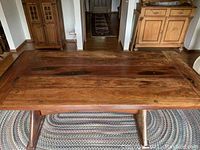 Top view showing plank-style solid teak tabletop and natural grain patterns