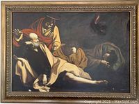 Frontal image of the canvas painting showing four figures in a night scene with dramatic lighting, framed in an ornate gold frame.