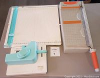 We R Square Punch Board, We R Trim & Score Board, and Tonic Professional Paper Trimmer together on a table