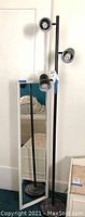 Full view of the floor lamp and mirror showing lamp height and mirror size