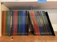 Shelf display of 29 hardcover MHQ Quarterly Journal of Military History books in various spine colors.
