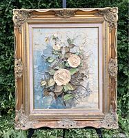 Full view of vintage floral still life painting with white roses in thick impasto and baroque gilt frame.