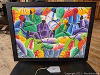 Full view of the framed colorful oil painting showing the Jamaican market scene with stylized figures and fruit.