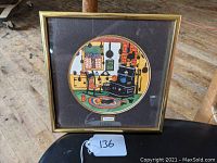 Full view of the framed artwork titled "Memories" displaying the colorful kitchen scene inside a gold-tone frame.