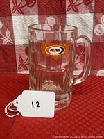 Front view of vintage A&W Root Beer mug showing USA map logo on glass with handle on right side.