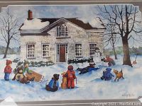Close view of the print showing children playing in snow in front of a stone house with a snowman, signed by Shirley Hulley.