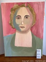 Front view of the original unsigned portrait art on canvas with stylized face and broad brush strokes, showing color and condition.