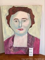 Portrait painting of a woman with red hair on canvas; front full view shows condition and colors.