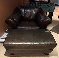 Front view showing both armchair and ottoman side by side