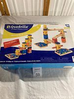 Closed box view showing Quadrilla Melody Basic Set branding and sound block type with piece count