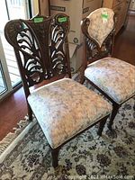 Pair of vintage wooden chairs with upholstered seats and backs, art nouveau carvings including Green Man face