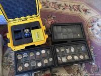 Yellow Invicta hard case open to show one Invicta watch and instruction booklet