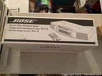 Front and top view of boxed Bose Acoustic Wave II multi-disc changer