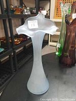 Frosted glass Art Deco style vase with flared ruffled rim, 8.5 inches tall, in good condition.