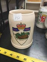 Front view of ceramic stein showing a shield design with crown, ship, and '3 BTY RCHA' text